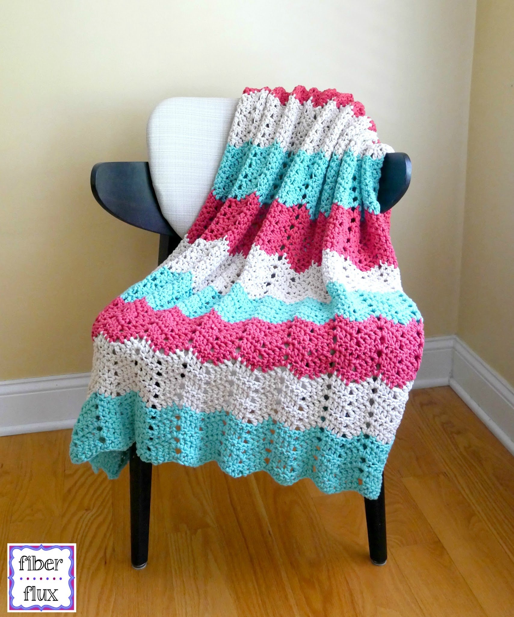 Designed by Jennifer Dickerson of Fiber Flux, the Boardwalk Breeze Blanket is super cozy and easy to crochet. It uses Bernat Maker yarn in 3 colors and an 8 mm crochet hook so it's quick to crochet. When complete your warm blanket measures 50 inches X 60 inches but you can easily make other sizes too. The free written pattern is available and you can watch the video on YouTube here.