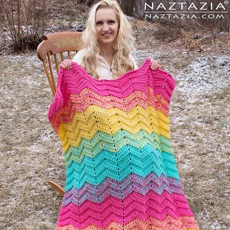 Designed by Donna Wolfe of Naztazia, the Double Sweet Ripple Blanket is made using 2 strands of Worsted Weight Yarn and an 8 mm (L) crochet hook. The stitch multiple is included in her post so you can make any size blanket you'd like. You can also download the free PDF crochet pattern on her site to follow along with as you watch the video tutorial here.