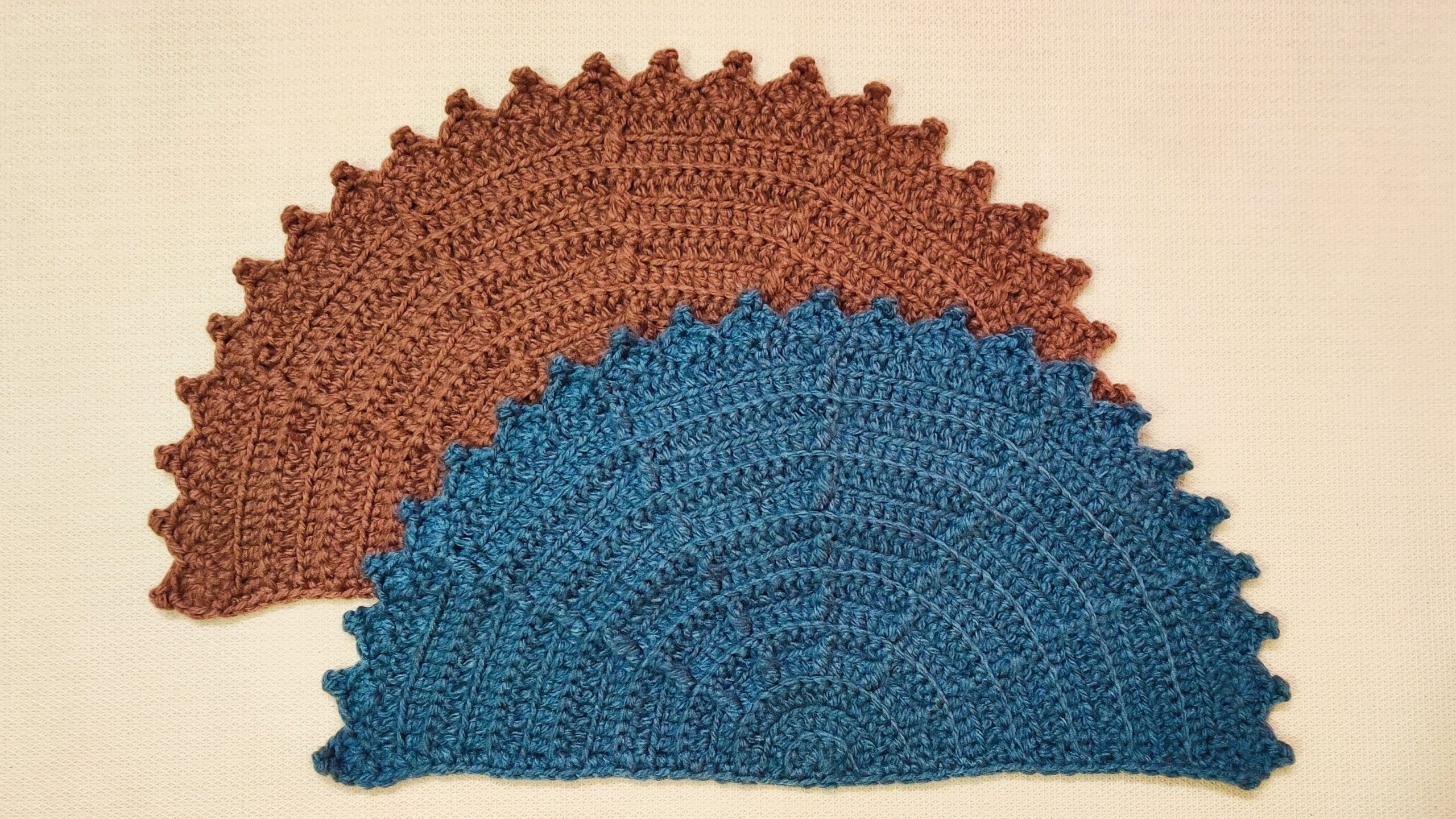 Learn how to crochet your own textured half circle rug with this free pattern and video from Raji's Craft Hobby.