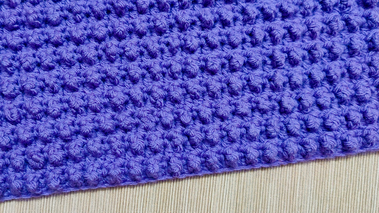 Make this easy Treble Flock Blanket with the free crochet pattern and video from Raji's Craft Hobby.