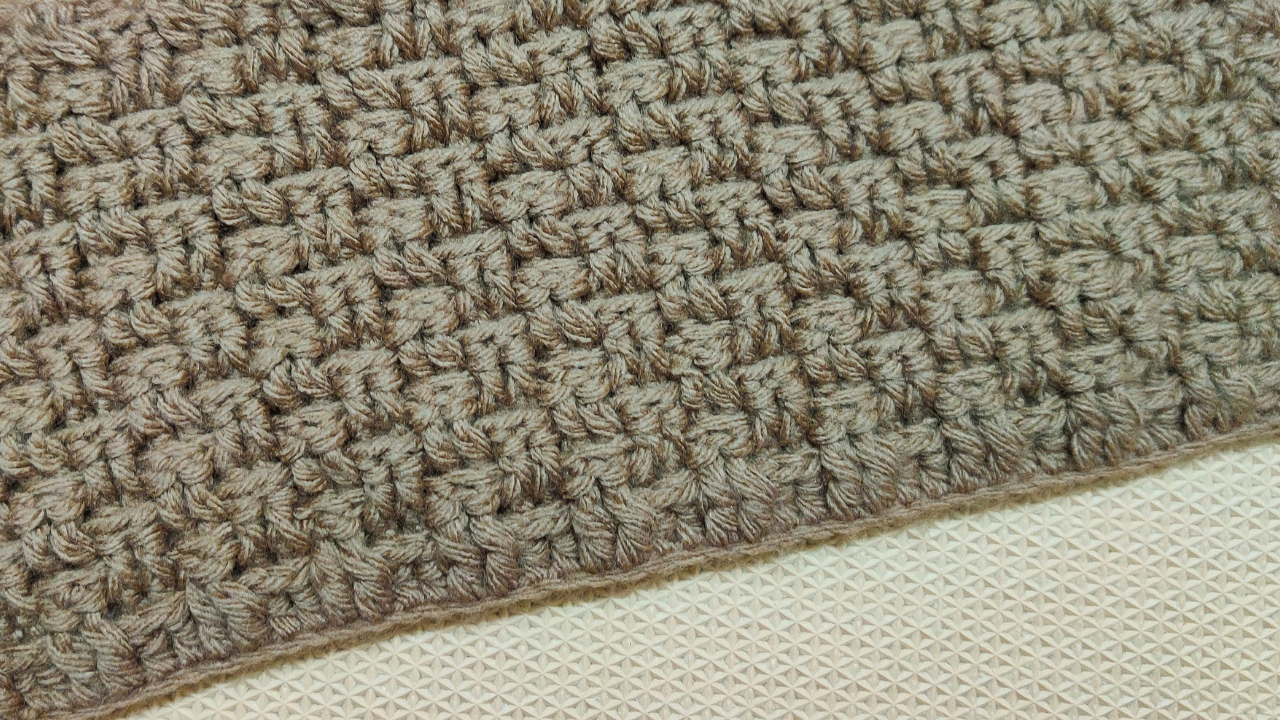 Learn how to crochet a Woven Blanket with this free crochet pattern and video tutorial from Raji's Craft Hobby.