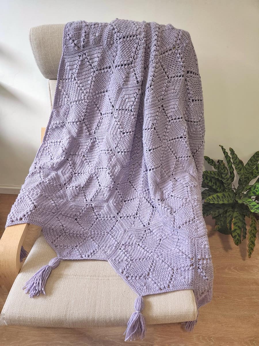 The Diamonds Hexagon Blanket pattern is made from joined hexagons.