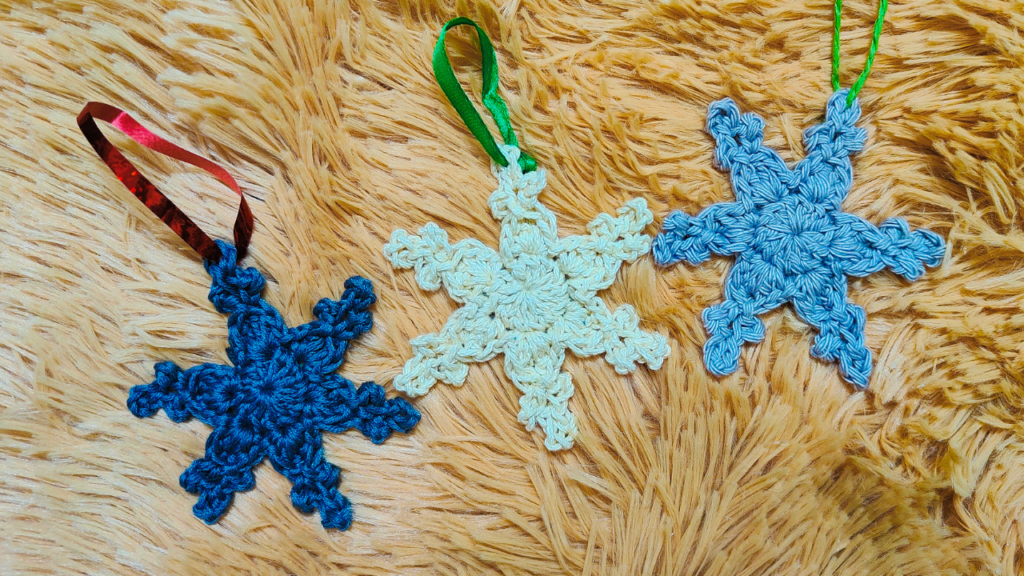 Here is a Quick and Simple Crochet Snowflake Ornament pattern. The Pattern is very simple and quick to make. You can easily make a couple of these pretty snowflake ornaments in no time at all. These Snowflake Ornaments are definitely fun to make and a very easy holiday project!