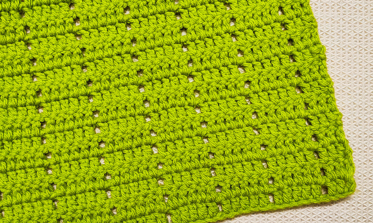 Learn how to make this Easy Filet Crochet Blanket with the free pattern and video tutorial from Raji's Craft Hobby.