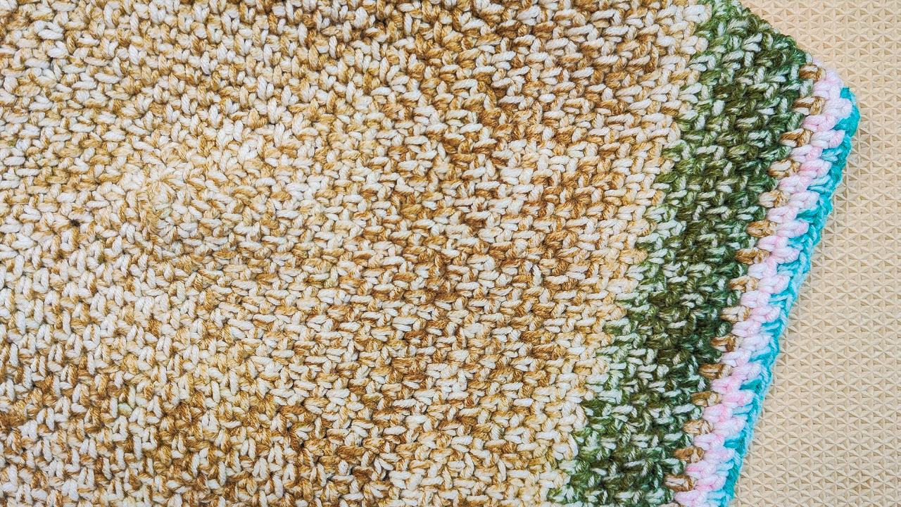 Learn how to make the square Moss Stitch Blanket with the free pattern and video tutorial from Raji's Craft Hobby.