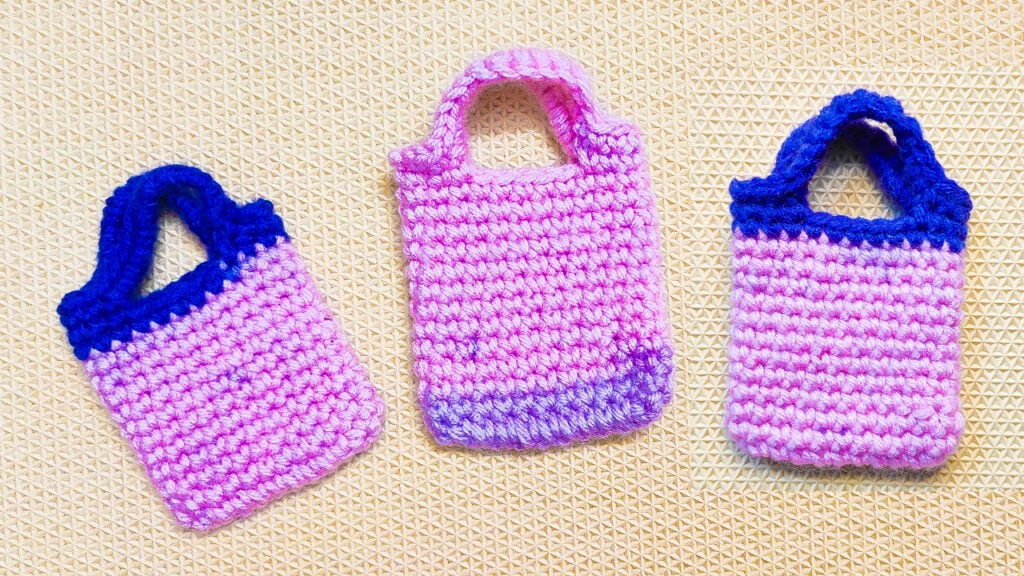 Make this quick mini tote bag with the free crochet pattern and tutorial from Raji's Craft Hobby.