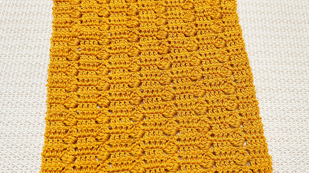Learn how to crochet this easy two row repeat crochet stitch and make an easy table runner. Get the free written pattern and tutorial from Raji's Craft Hobby.