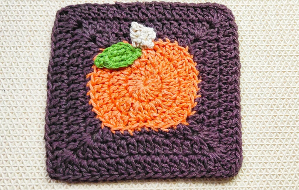 🍂 Get cozy with this easy Crochet Pumpkin Square! A perfect fall project for blankets, table decor, or accessories. #CrochetPumpkin #FallVibes