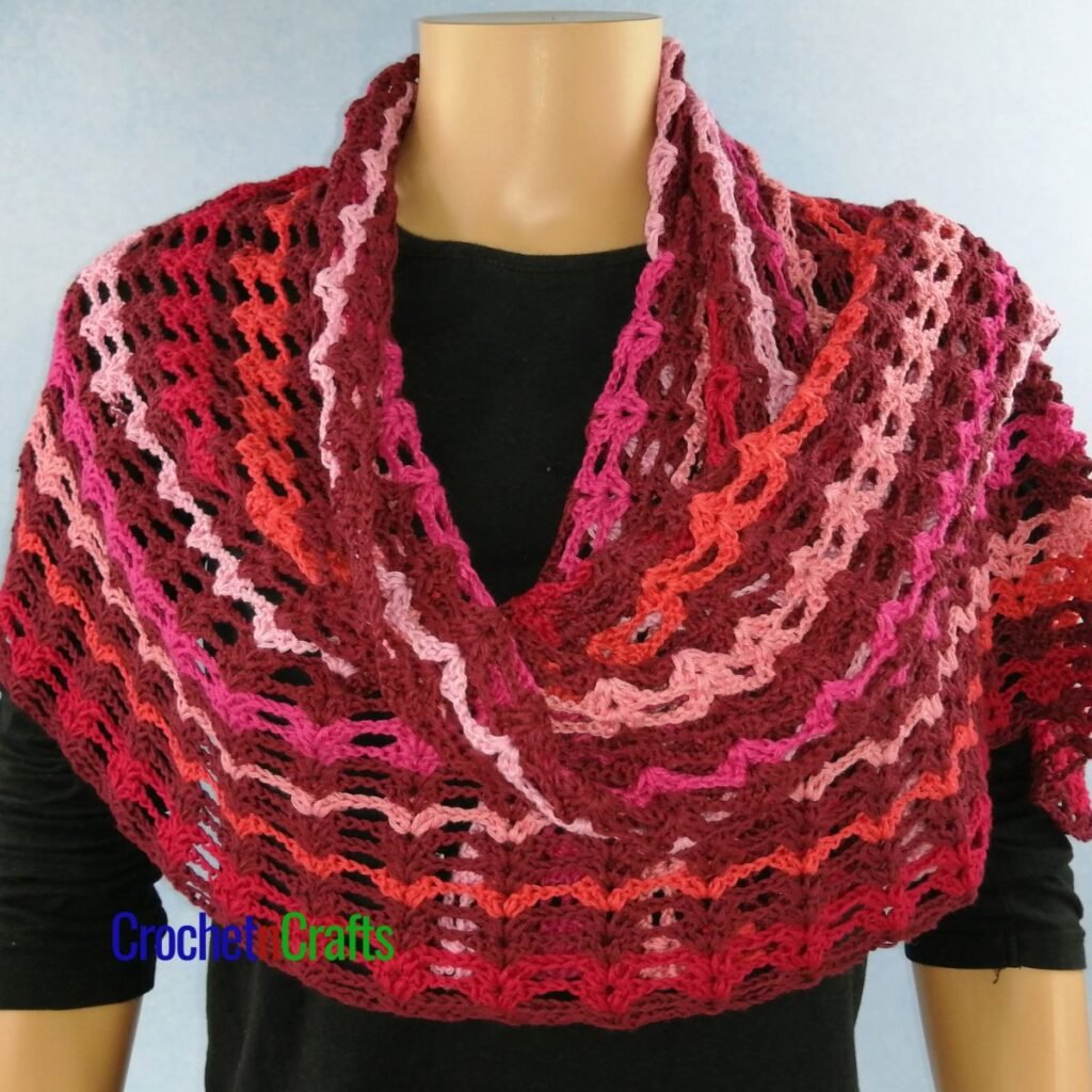 This lace-weight shawl pattern is perfect for the summer, but can be worn with any outfit throughout the year! It'll be the perfect accessory to go with a dressy outfit, or with a T-shirt and a pair of jeans. Regardless of your style, this shawl pattern is perfect.