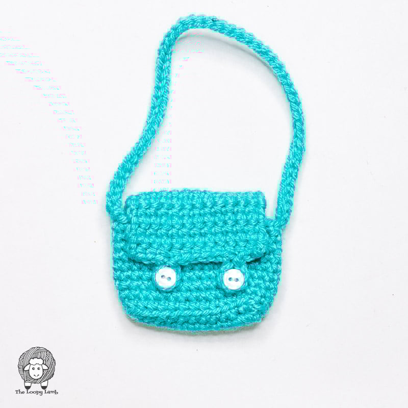 Create this adorable crochet tote bag for dolls! It’s quick, easy, and perfect for storing little treasures. Get the free pattern and video tutorial now.