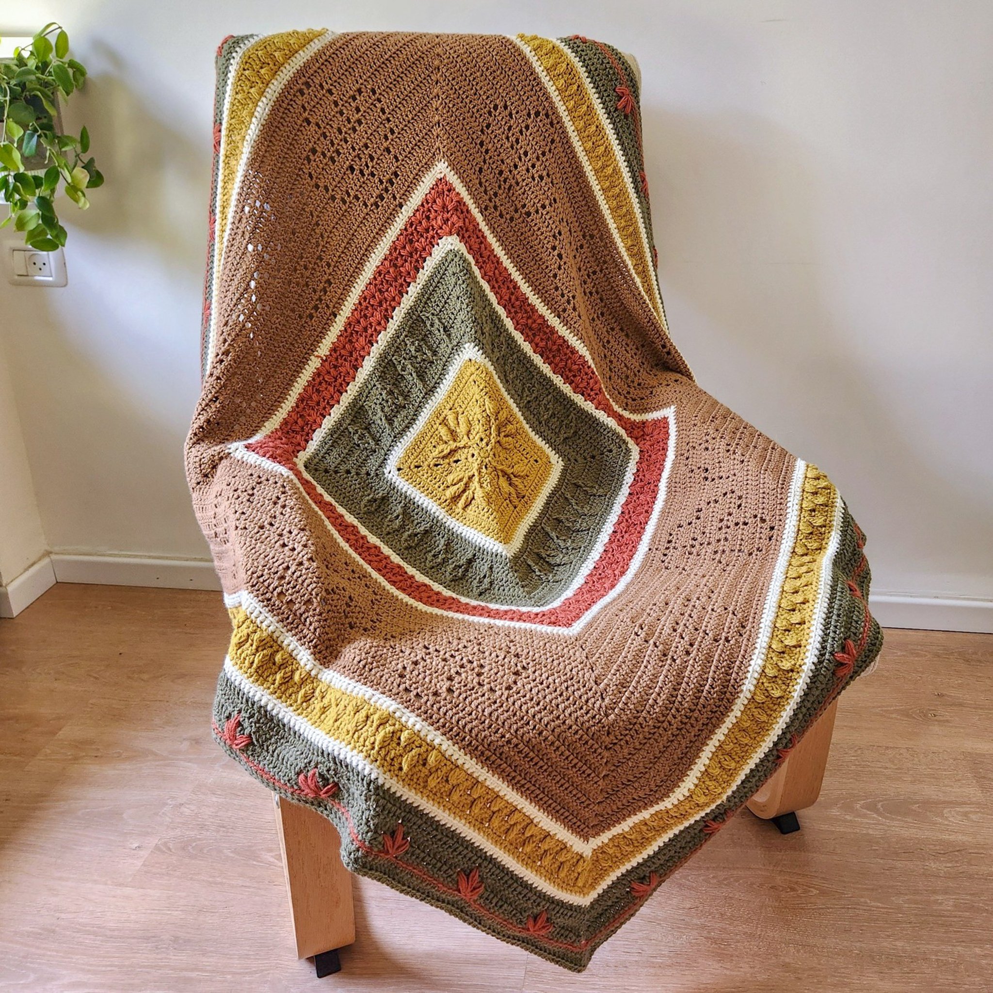 Join this free 6-part crochet-along to make a cozy autumn blanket featuring leaf-inspired textures. Includes full video tutorial.