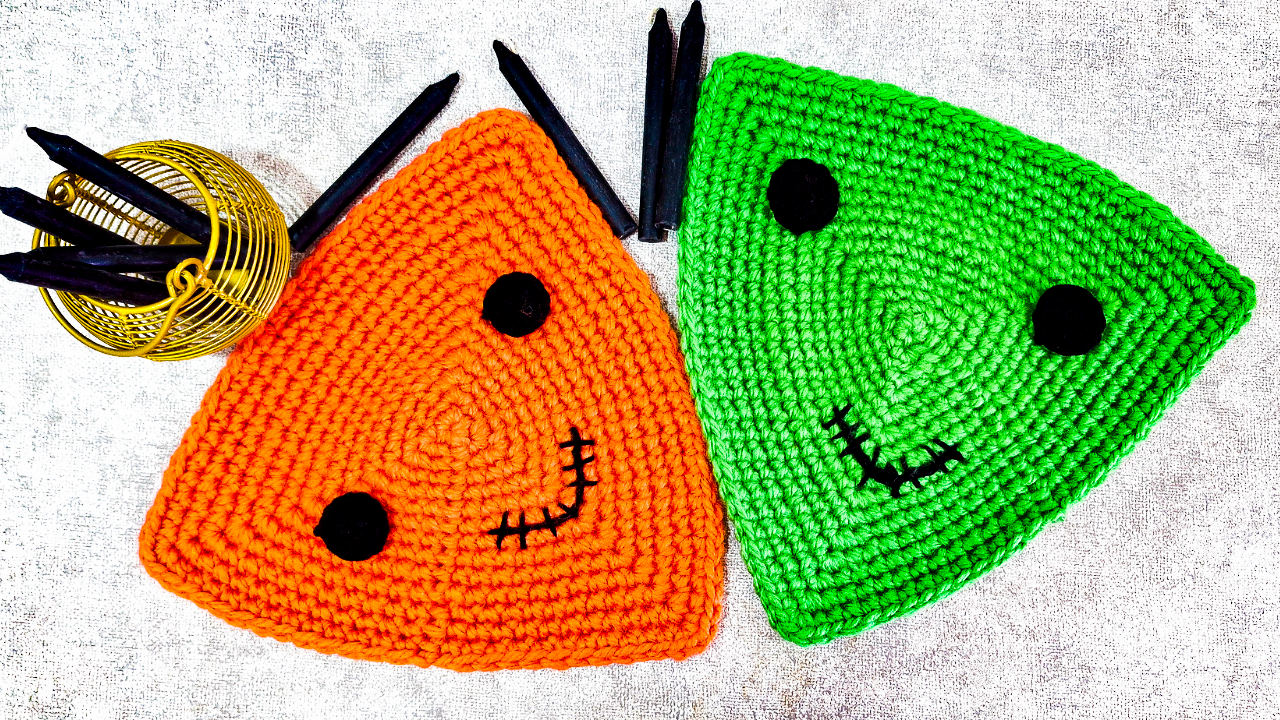 Crochet this quick and easy Halloween Triangle Placemat with the free pattern and video from Raji’s Craft Hobby. Perfect for festive table décor!